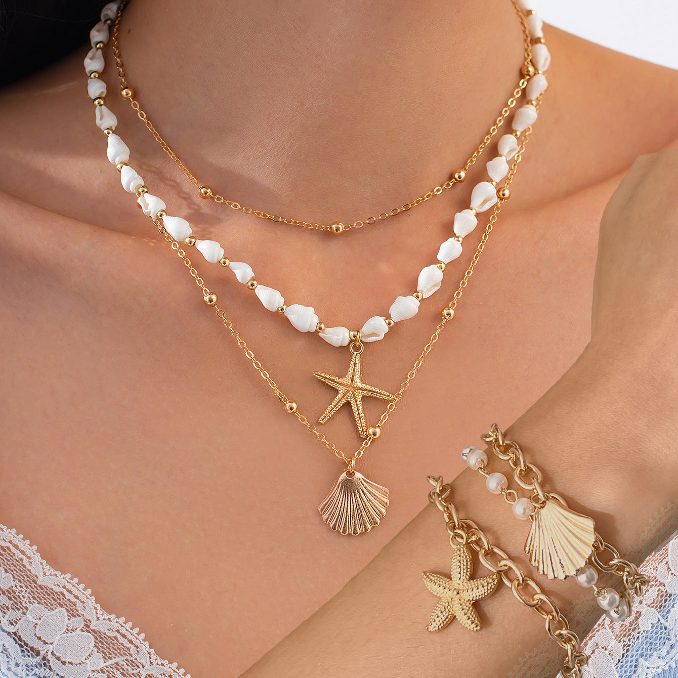 Collana con ciondolo a stella in lega di zinco impilabile con nappa e catena irregolare da donna