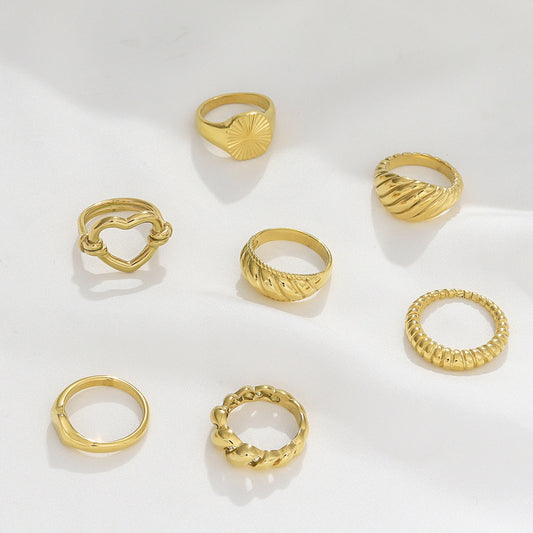 Anello da donna alla moda stile OL in acciaio inossidabile a forma di cuore geometrico cavo ritorto con finitura placcata