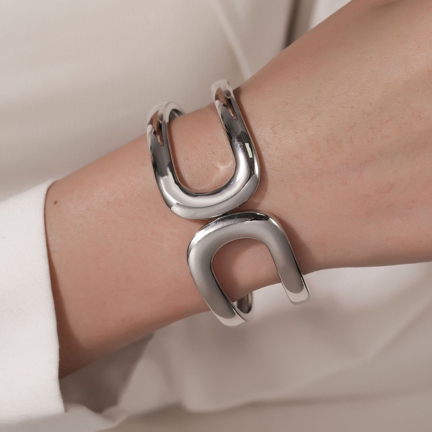 Minimalist Cool-Tone Alloy Bracelet with Hollow Double Circular Arc Design Spring-Opening Bangle for Women