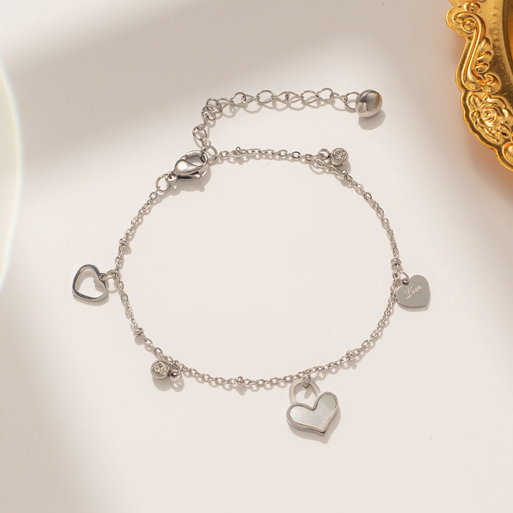 Sweet Feminine Titanium Steel Rhinestone-Inlaid Heart-Shaped Hollow Shell Bracelet for Women