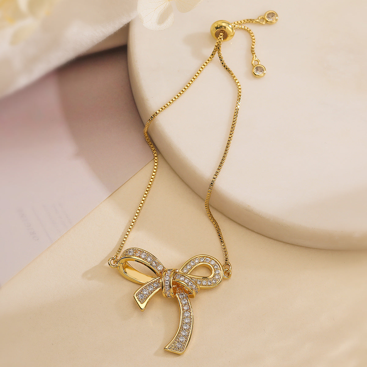 Sweet Style Bowknot-Shaped Hand Chain for Women Made of Brass with Real Gold Plating and Micro-Paved Zirconia