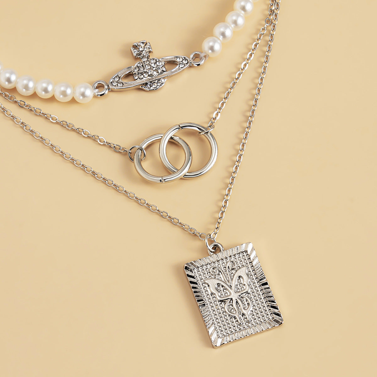 Collana geometrica a doppio anello con perline, ciondolo a forma di pianeta e farfalla con strass, gioielli placcati in lega da donna