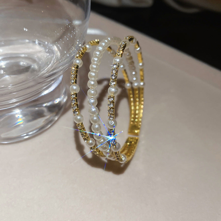 Elegante brazalete abierto de doble capa con perlas y diseño geométrico redondo, incrustaciones de pedrería y estilo vintage, accesorio minimalista de lujo
