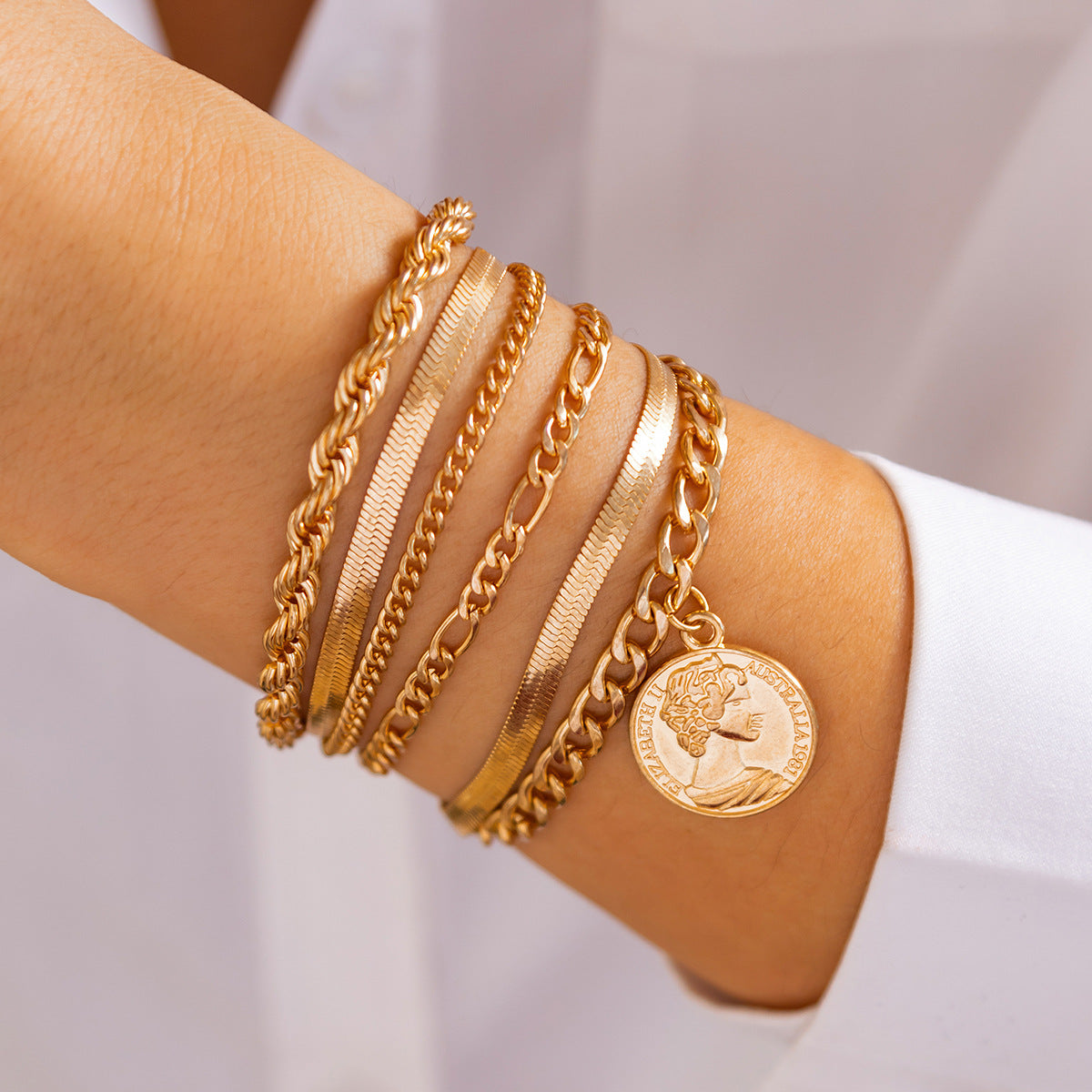 Minimalist Geometric Pearl-Style Beaded Bracelet Set with Tassel and Chain Accents for Women