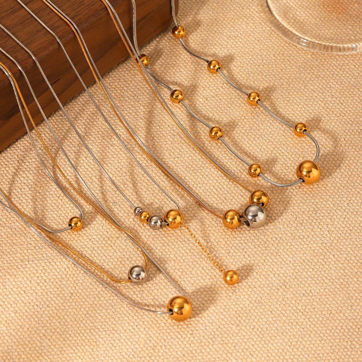 Minimalist Geometric Round Bead Pendant Necklace for Women in Stainless Steel with Titanium Steel Charm and Gold Plated Snake Chain