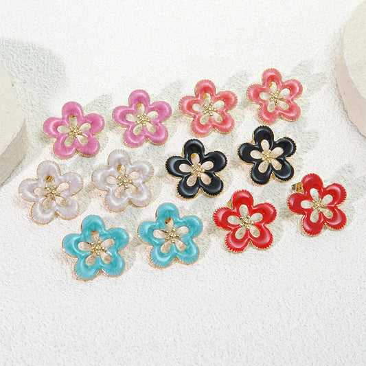 Pendientes de acero inoxidable florales con aceite dulce
