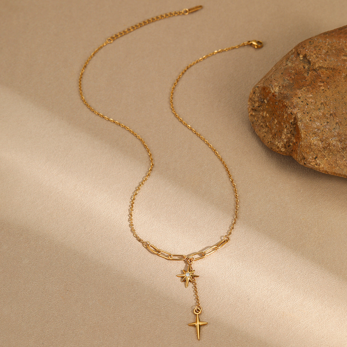 Minimalist Clavicle Necklace with Eight-Pointed Star Pendant, Rhinestone Inlay, Stainless Steel, Plated Finish, Tassel and Cross Accents