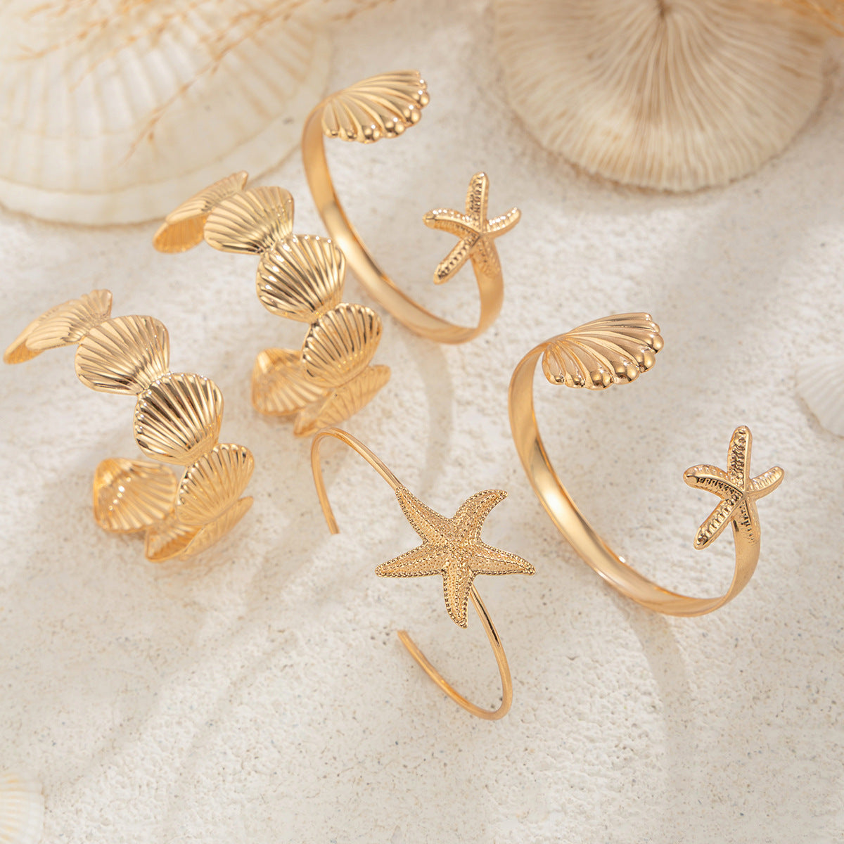 Bracciale rigido aperto minimalista da donna con stella marina, ispirato all'oceano, in metallo placcato