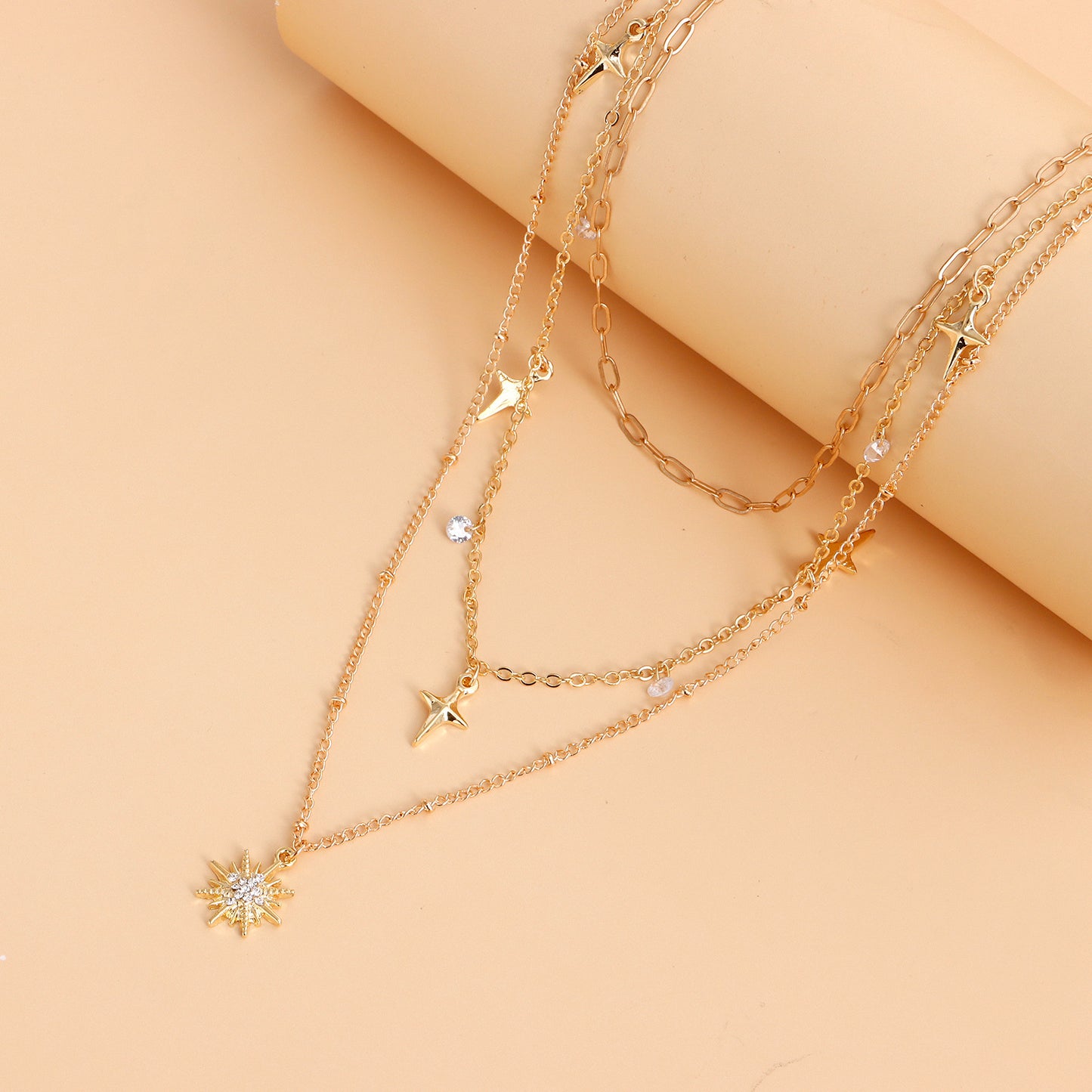 Punk Luxe Geometric Eight-Pointed Star Pendant Necklace with Rhinestone Inlay and Gold-Plated Alloy Chain