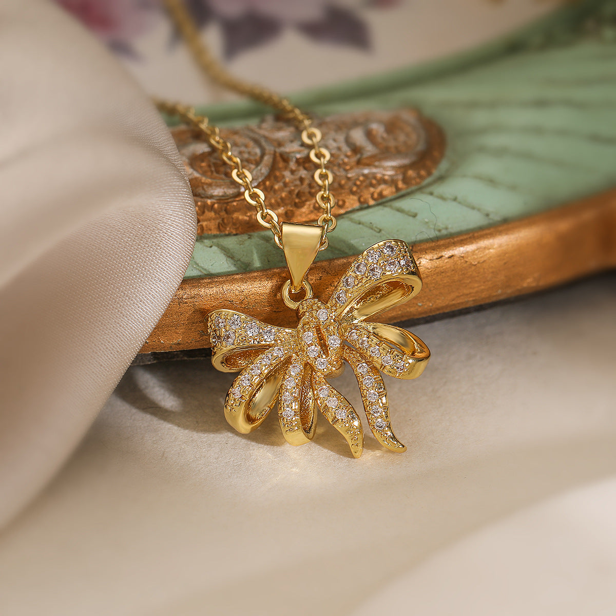 Minimalist Bow-Shaped Copper Pendant Necklace with Real Gold Plating and Zircon Accents for Women
