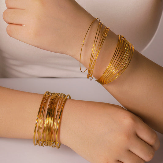 Braccialetto da donna multistrato a filo, in acciaio inossidabile placcato oro 18K, stile minimalista