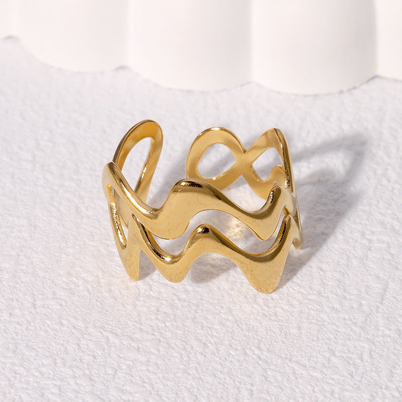 Anello da donna in acciaio inossidabile con texture a onda geometrica minimalista e finitura placcata