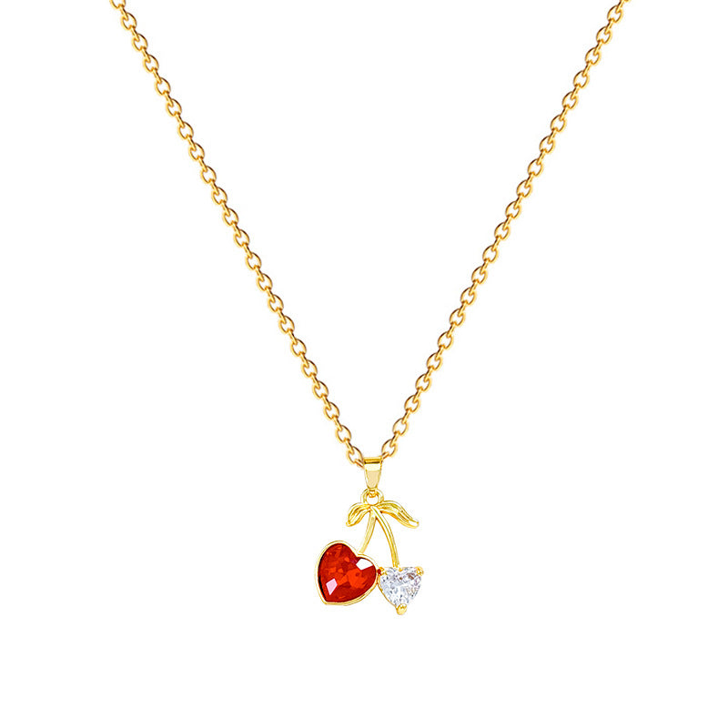 Collana con ciondolo a forma di ciliegia e frutta a cuore in stile cartone animato da donna con intarsio di strass su catena in acciaio inossidabile