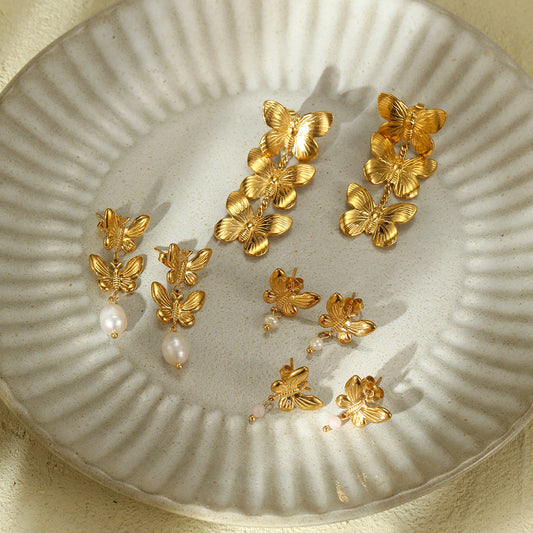 Pendientes de Perlas con Forma de Mariposa de Moda en Acero de Titanio con Acabado Chapado para Mujer