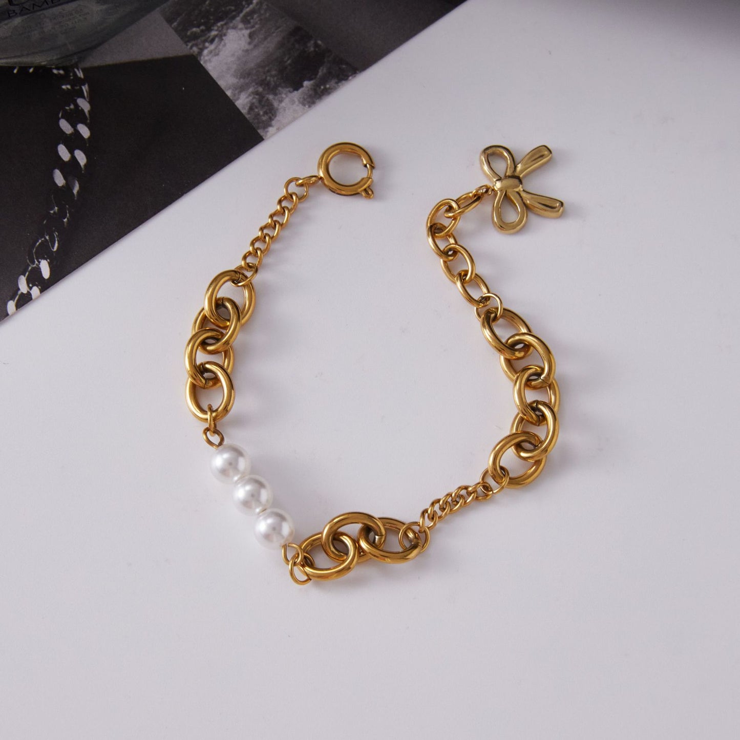 Elegante pulsera de acero inoxidable con lazo para mujer con acabado chapado, diseño geométrico, a la moda para la oficina