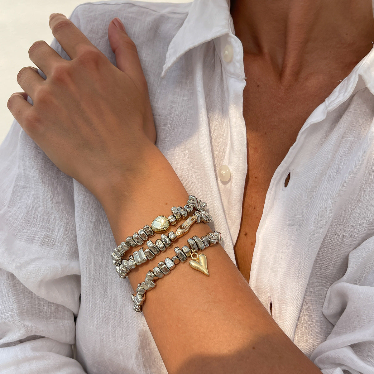Bracciale da donna con perline a forma di cuore geometrico individualistico e nappine
