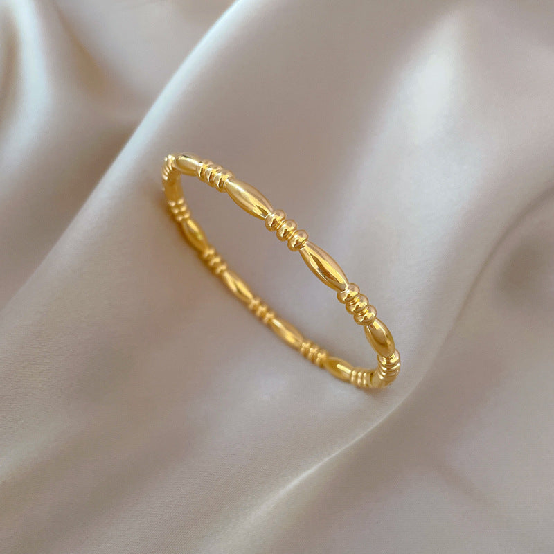 Pulsera Zen Minimalista de Acero de Titanio con Acabado Chapado para Mujer y Hombre