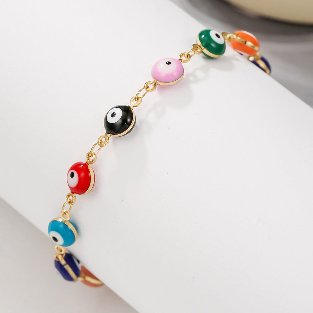 Cavigliera e braccialetto in acciaio inossidabile in stile bohémien colorato con occhio di Allah e motivi geometrici e a cuore