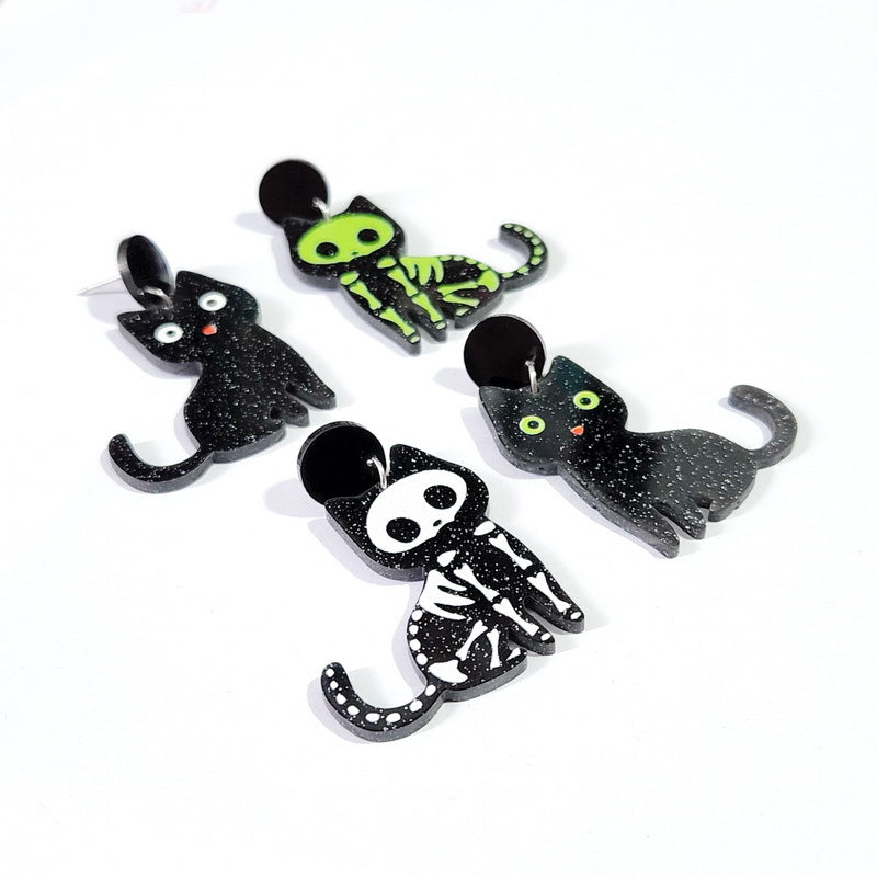 Pendientes de gato con temática de Halloween con ojos verdes y diseño de hueso Tachuelas acrílicas