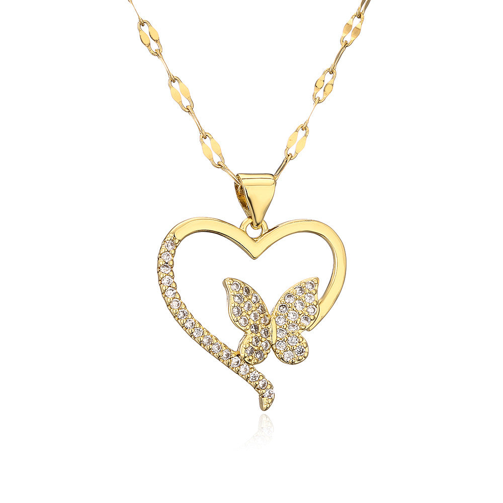 Collana con ciondolo a farfalla e cuore minimalista da donna in rame con placcatura in oro 18 carati e dettagli in zirconi