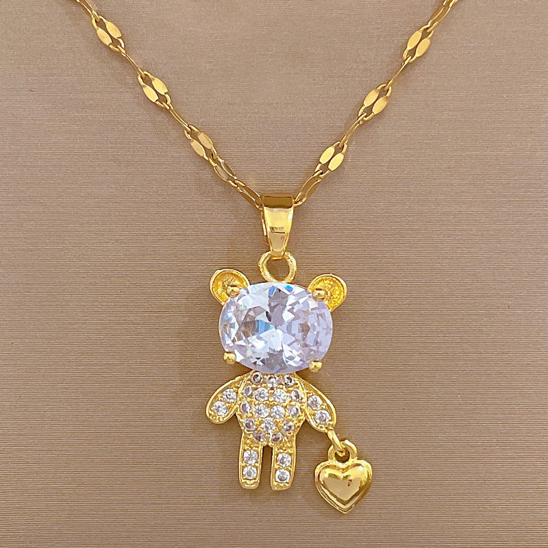 Collana in acciaio al titanio a forma di cuore stile cartone animato con intarsio di strass e grazioso ciondolo a orsetto per donna