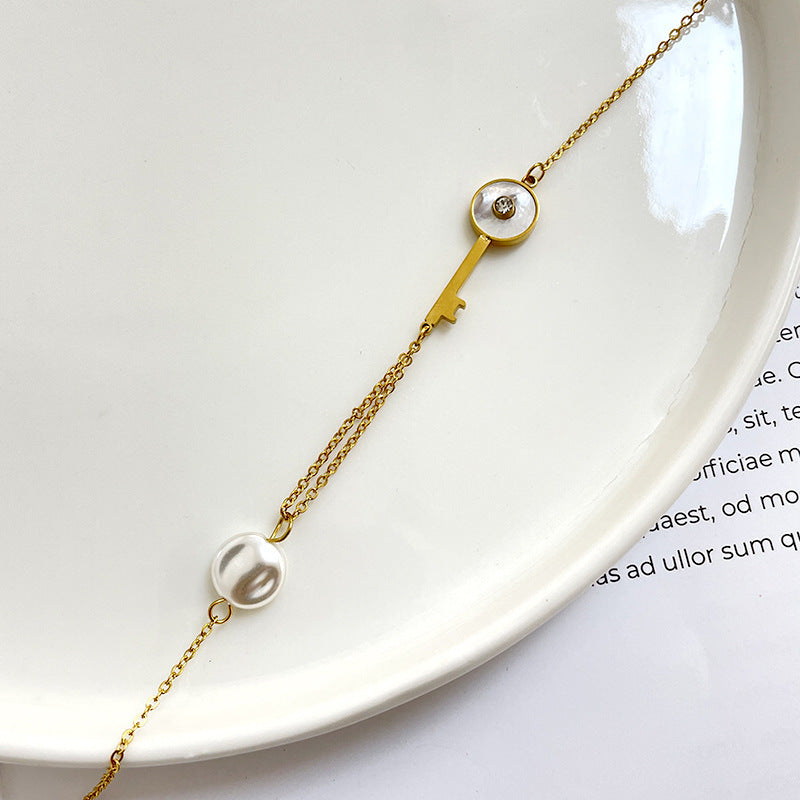 Bracciale a chiave geometrico minimalista in acciaio al titanio per donna con finitura placcata, gioielli dell'amicizia eleganti e sofisticati