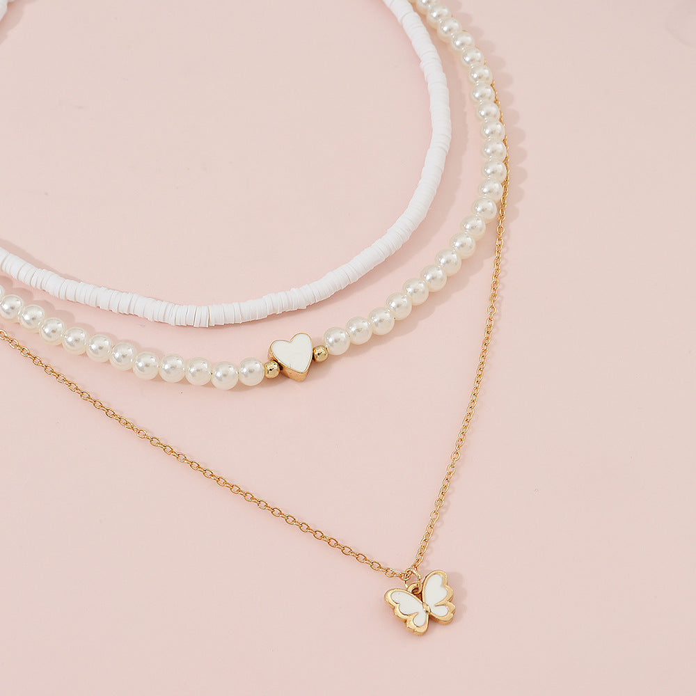 Set di collane con ciondolo a farfalla e cuore per ragazze, in lega a forma di farfalla con catena di perle, collana minimalista per bambini