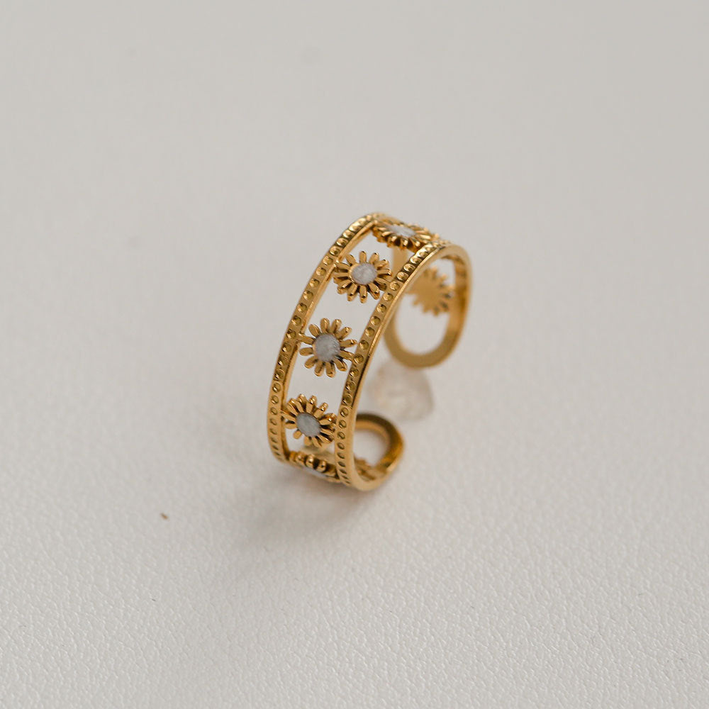 Anillo minimalista de acero de titanio con forma de girasol para mujer, con banda abierta ajustable y acabado chapado en oro