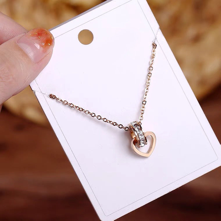 Minimalist Rose Gold Titanium Steel Heart-Shaped Pendant Necklace for Women with Rhinestone Inlay and Plated Finish