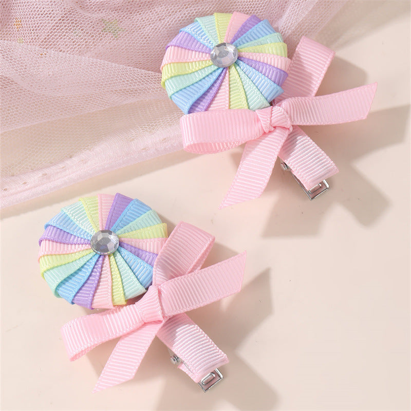Cute Pink Candy-Themed Hair Clip for Girls with Bow Shape Fabric Construction and Ruffled Mesh Detail