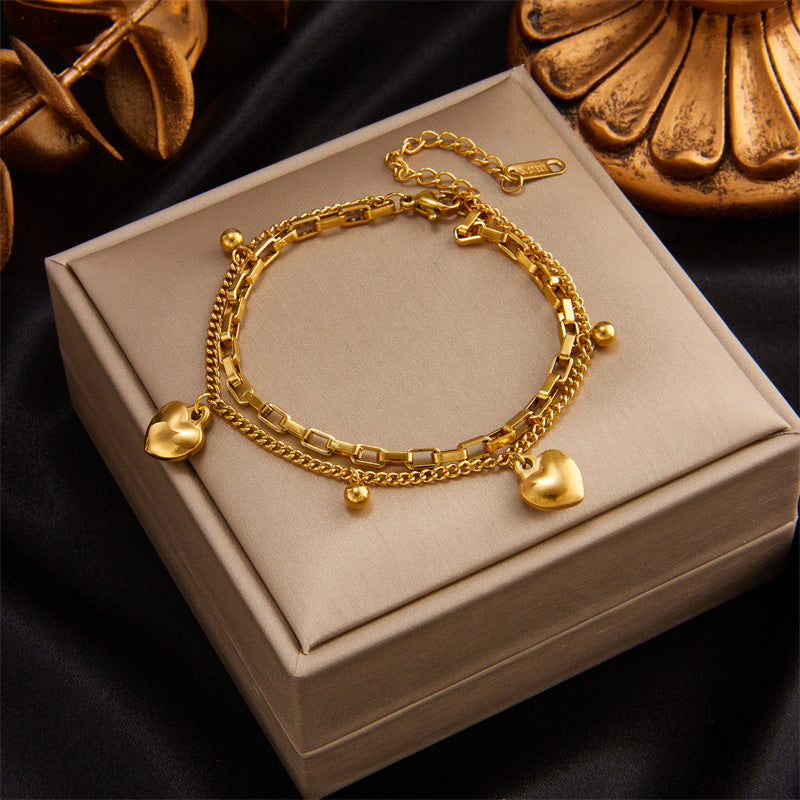 Bracciale Minimalista in Acciaio al Titanio a Strati con Ciondolo a Cuore, Cerchio, Sorriso, Farfalla e Occhio