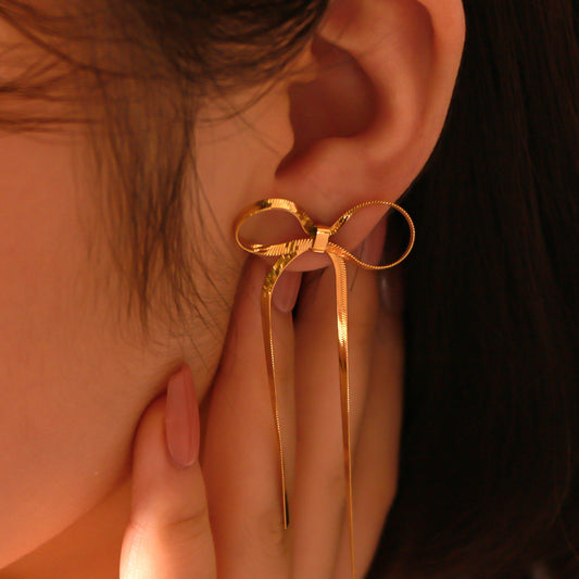 Fashion Bow-Shaped Tassel Long Earrings in Stainless Steel with 18K Gold Plated Snake Chain for Women