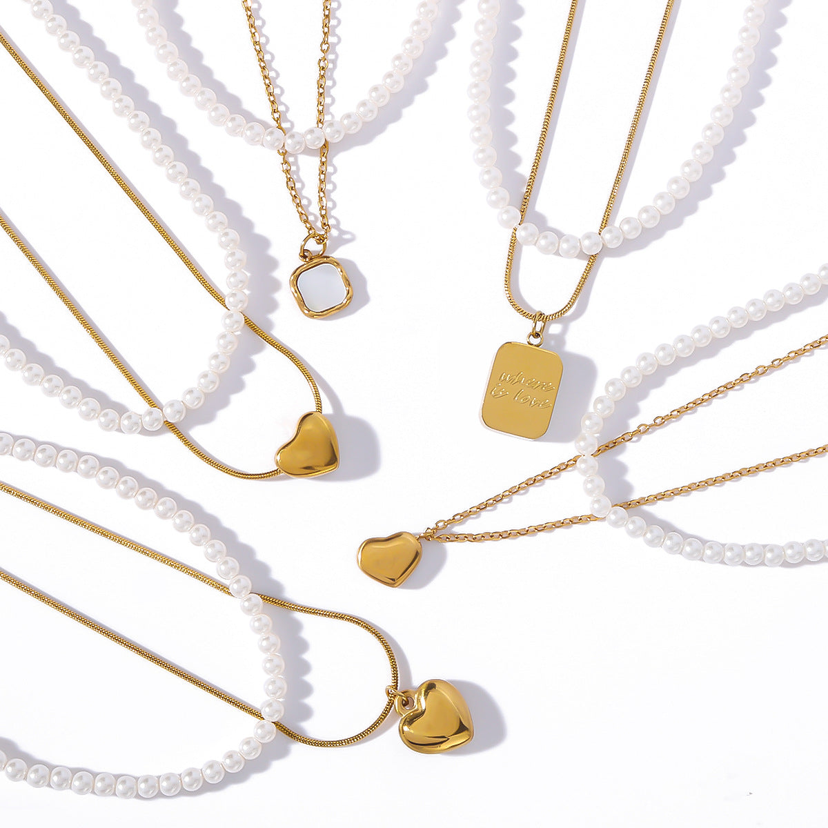 Collana vintage di lusso in acciaio inossidabile con pendente a cuore, placcatura in oro e intarsio in madreperla bianca per donna