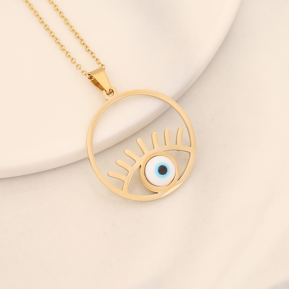 Collana con pendente a forma di occhio in acciaio inossidabile audace con finitura a olio a goccia