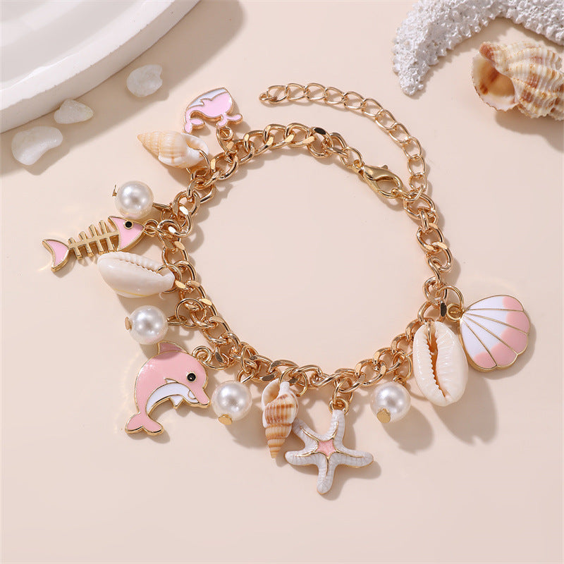 Pulsera de resina en forma de estrella con dijes de temática marina para niñas de 6 a 10 años