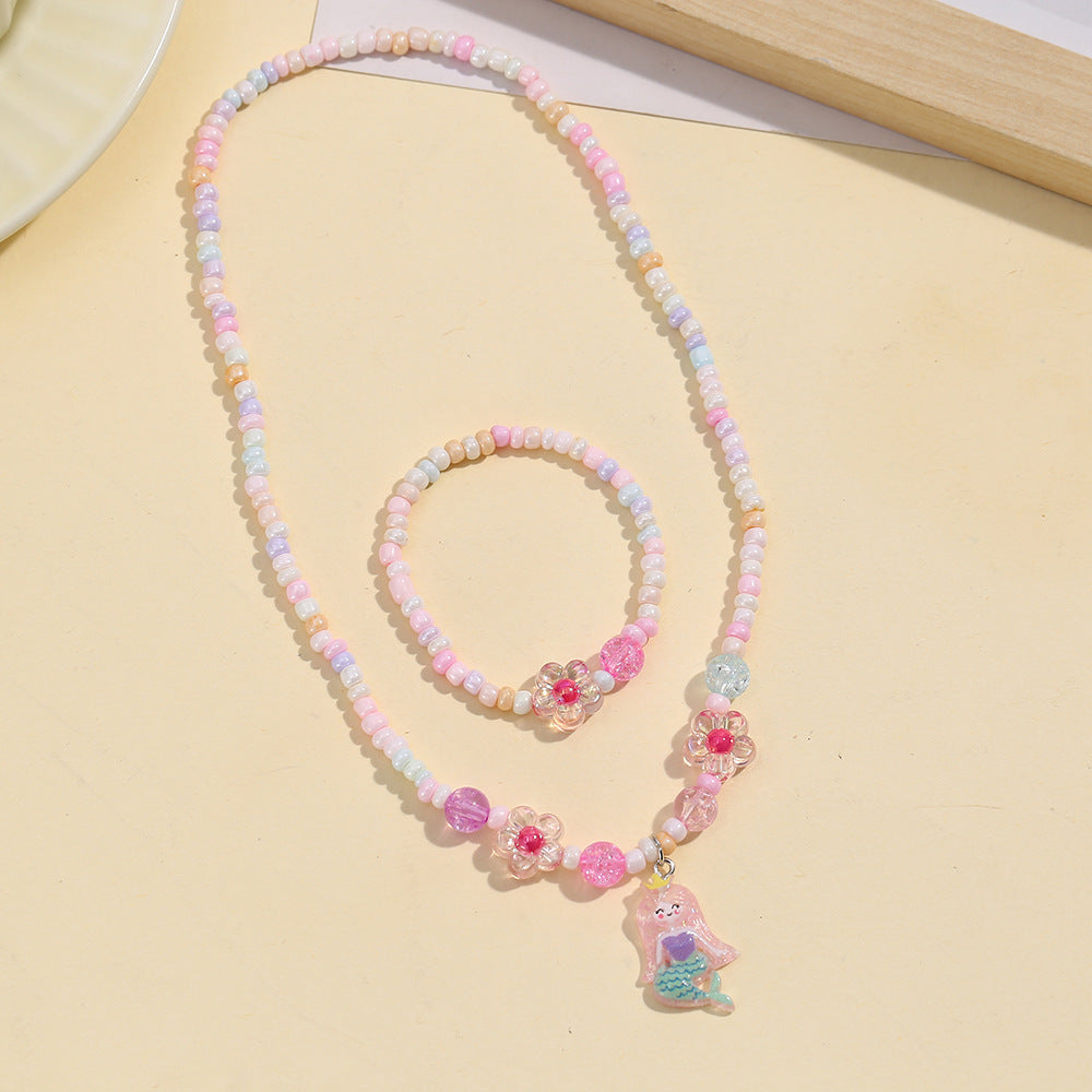 Lindo conjunto de collar de resina de sirena y unicornio para niños con detalles de arcoíris y cadena de cuentas redondas