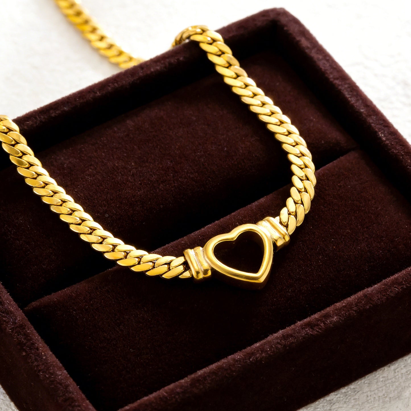 Elegante set collana e bracciale da donna in acciaio inossidabile placcato a forma di cuore