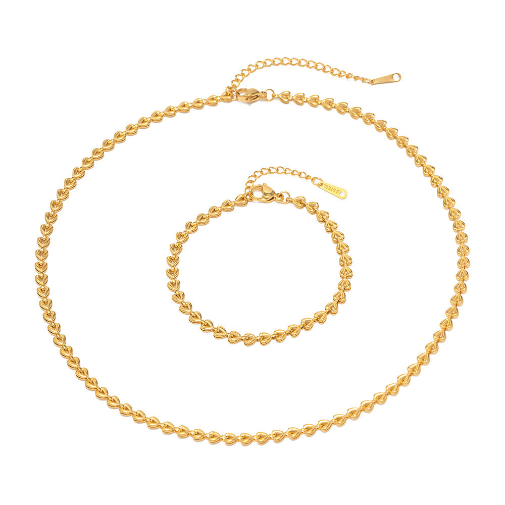 Bracciale da donna Trendy in acciaio inossidabile placcato oro 18 carati con catena intrecciata e cuore cavo
