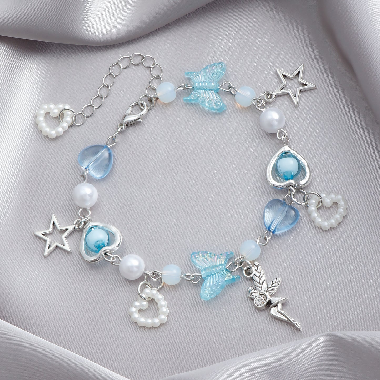 Bracciale da donna minimalista con perline a forma di cuore e stella, impreziosito da cristalli e catena in metallo placcato