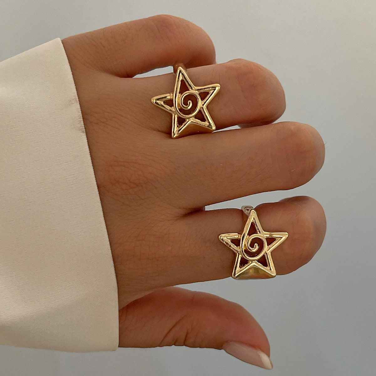 Set di anelli da donna in lega a forma di stella geometrica minimalista con finitura placcata