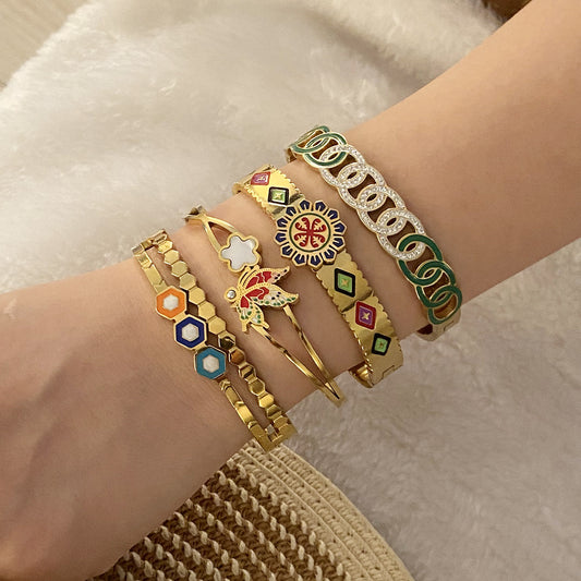 Pulsera de acero inoxidable floral vintage con acabado esmaltado y diseño de mariposa para mujer