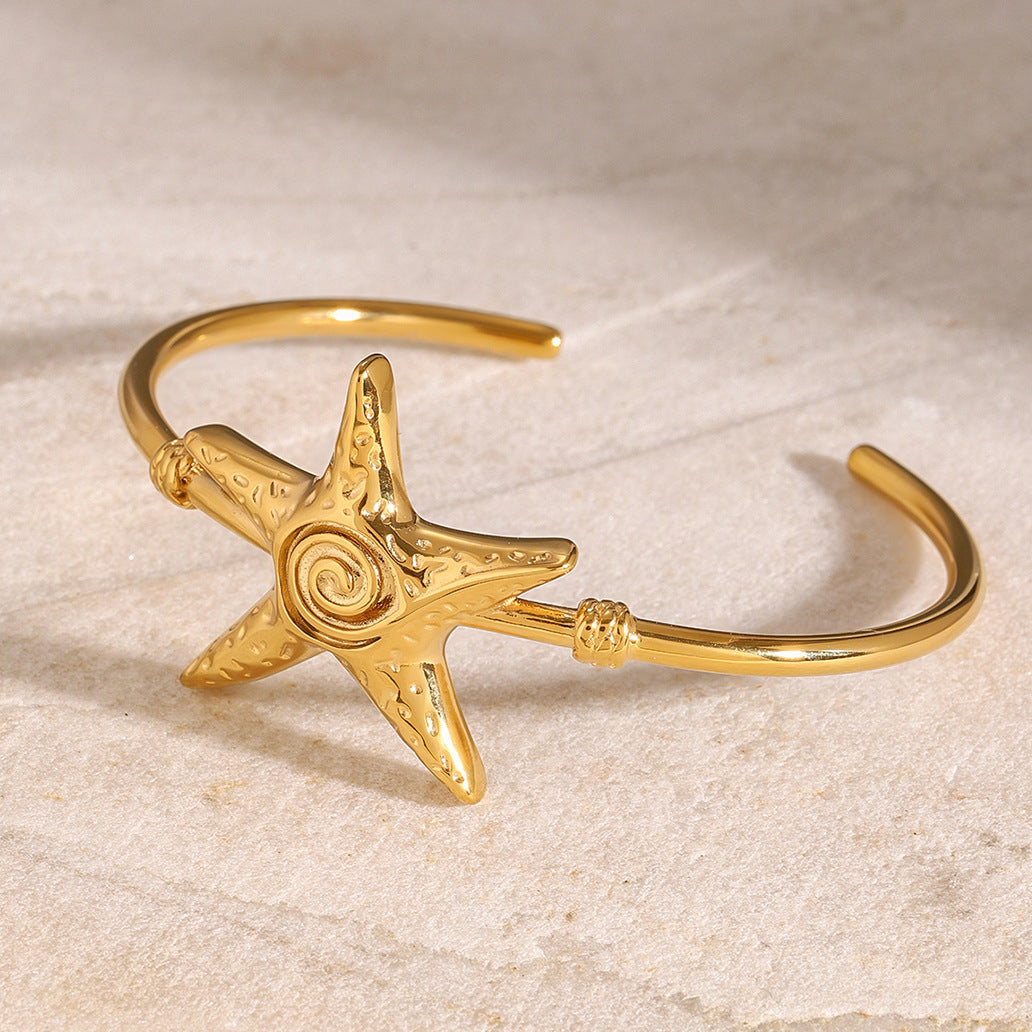 Elegante bracciale a forma di stella marina in acciaio inossidabile con finitura placcata per un look ispirato all'oceano
