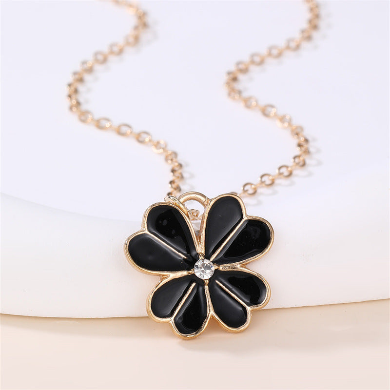 Collar con colgante esmaltado con forma de lazo floral dulce para niñas con dije de aleación y detalles de pedrería