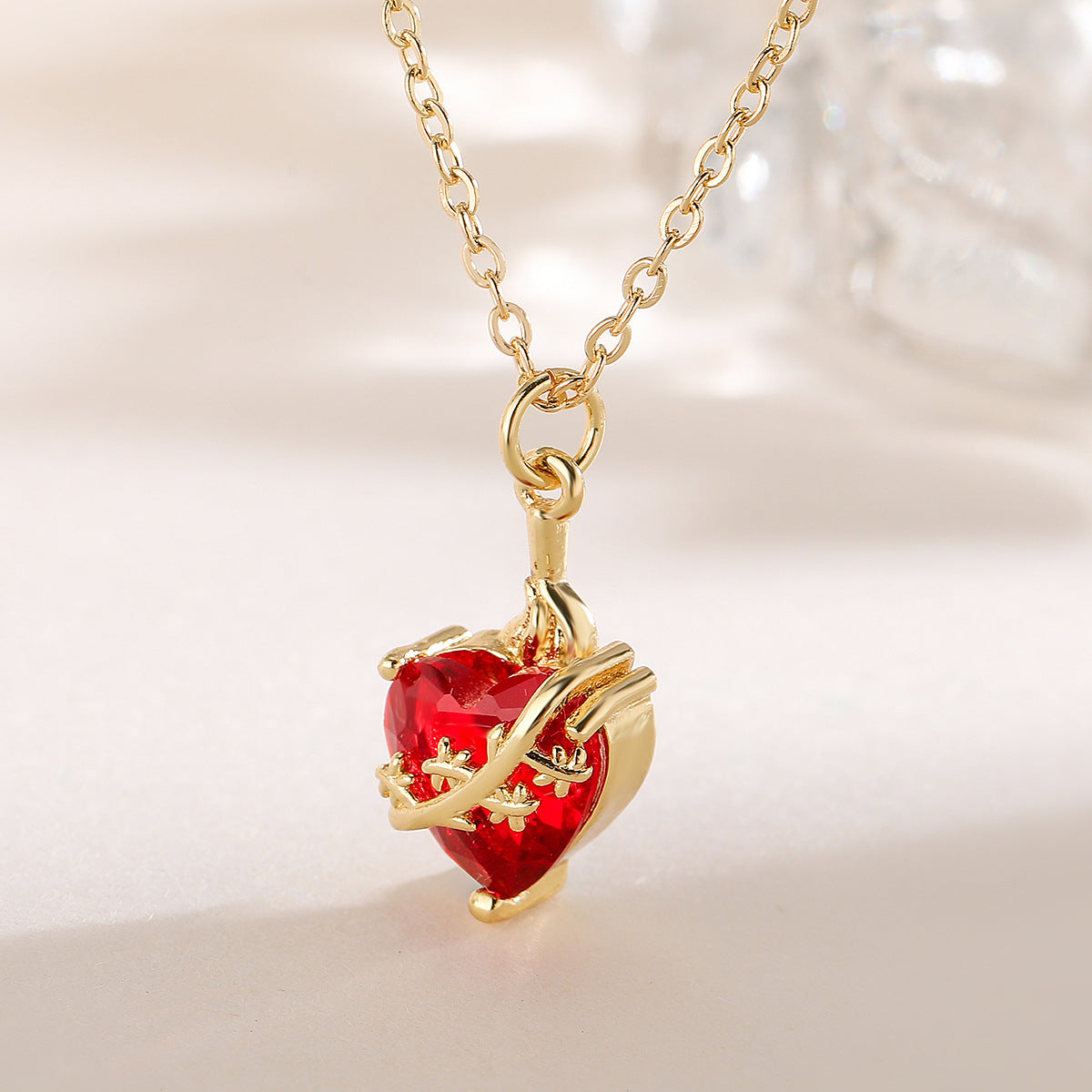 Fashionable Heart-Shaped Copper Pendant Necklace with 18K Gold Plating and Red Zircon for Women