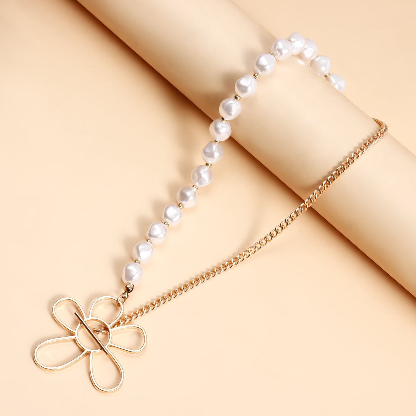 Geometric Hollow Flower Pendant Necklace for Women with Electroplated Metal Chain and Imitation Pearl Beads