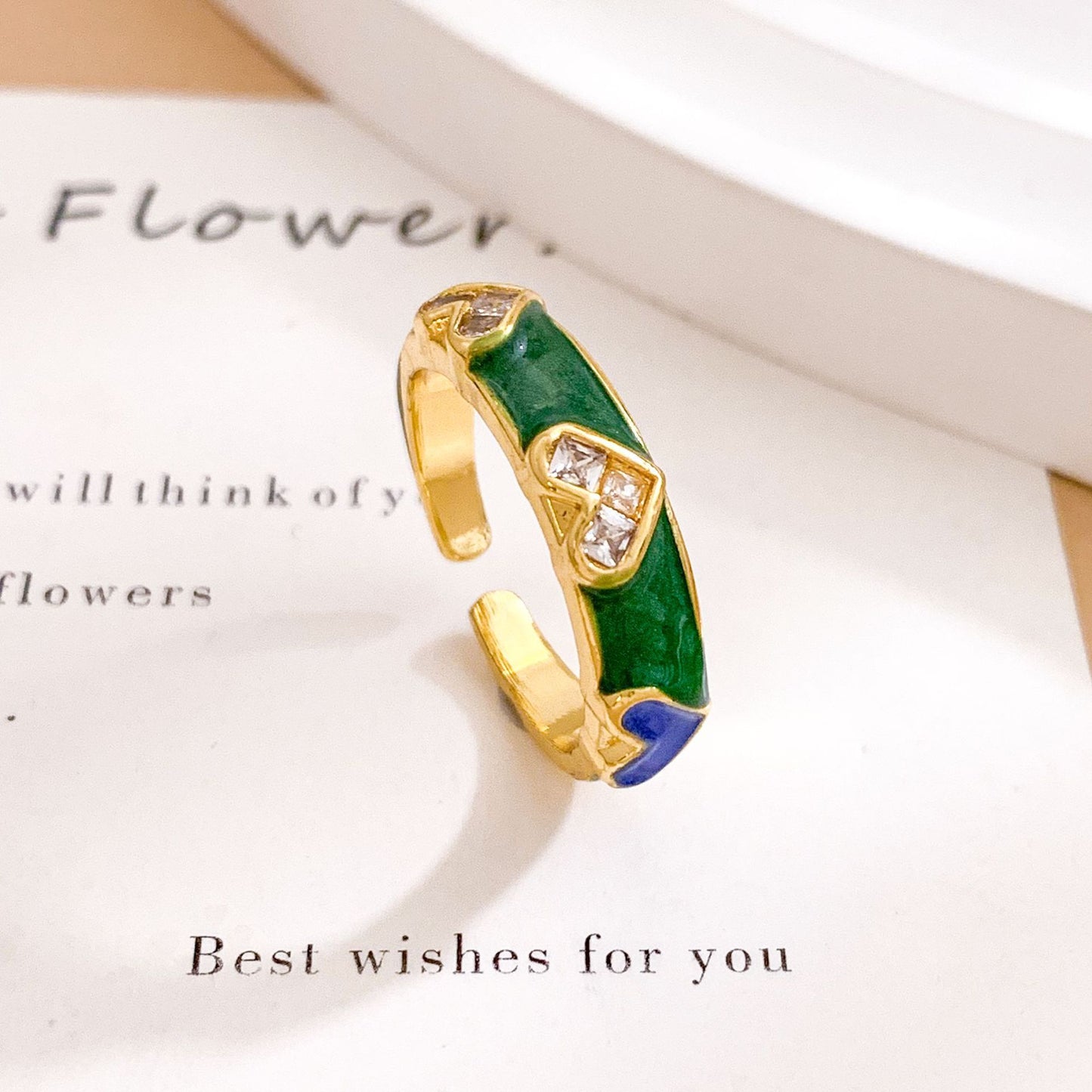 Anello regolabile da donna in ottone placcato, smaltato a goccia, con motivo floreale minimalista