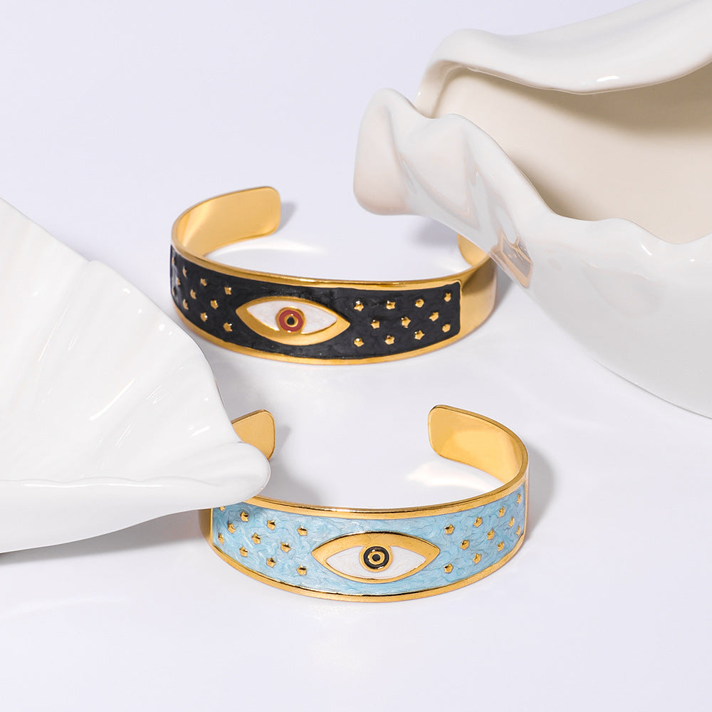 Bracciale rigido regolabile in acciaio inossidabile smaltato con placcatura in oro sottovuoto, motivo floreale geometrico e occhio di Fatima in stile vintage