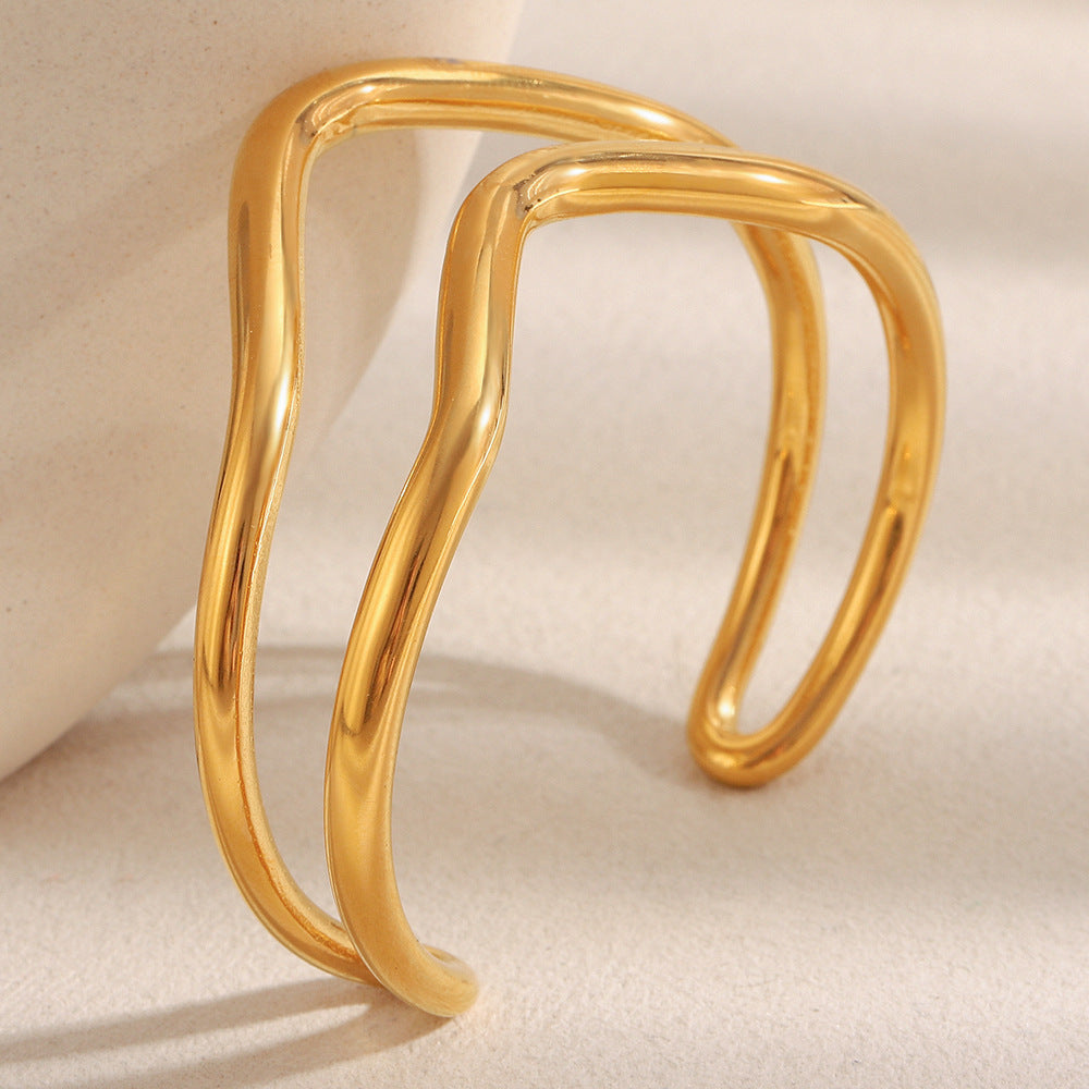 Minimalist Twisted Line Stainless Steel Bracelet for Women with 18K Gold Plating