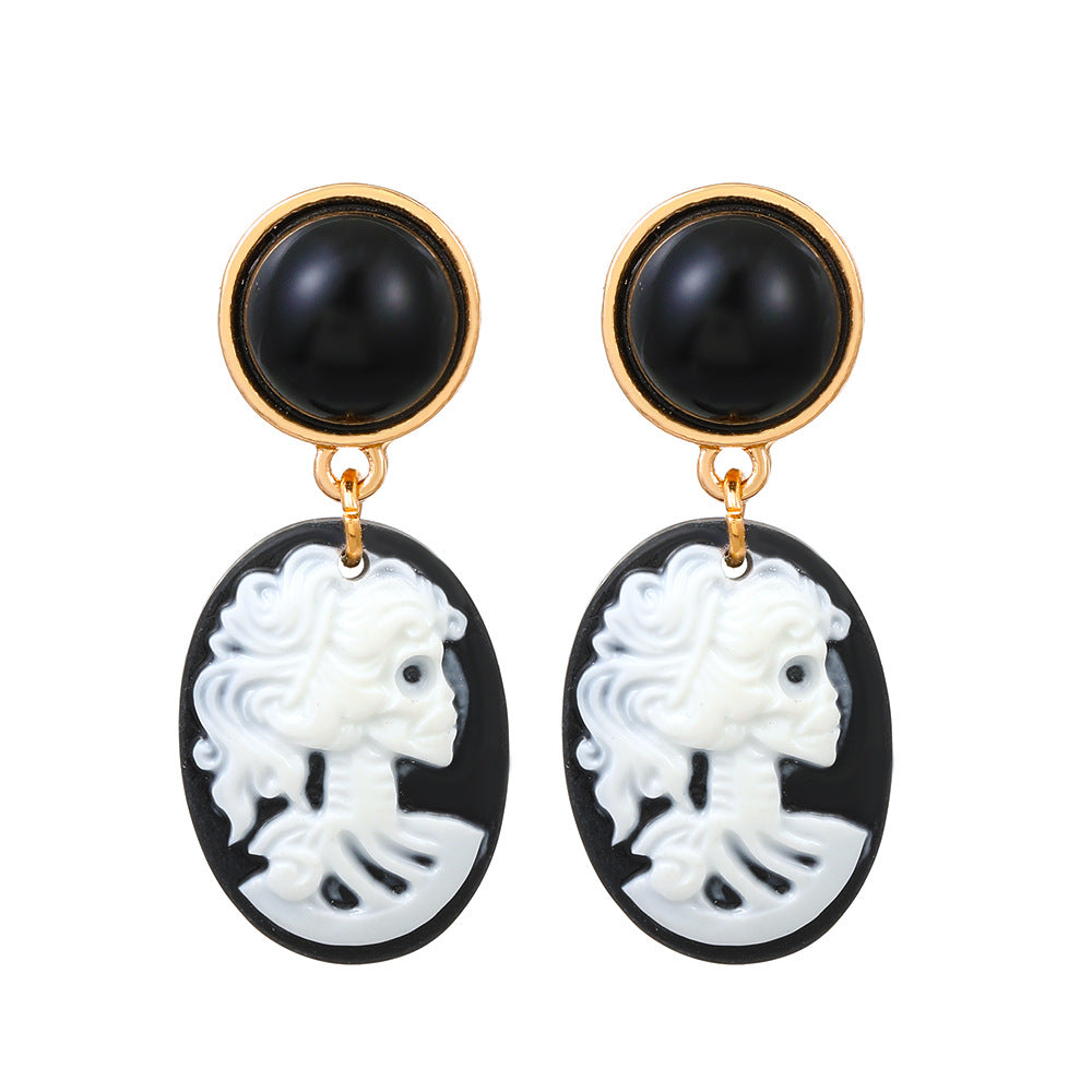 Pendientes góticos vintage de calavera con colgante en aleación con acabado galvanizado para mujer