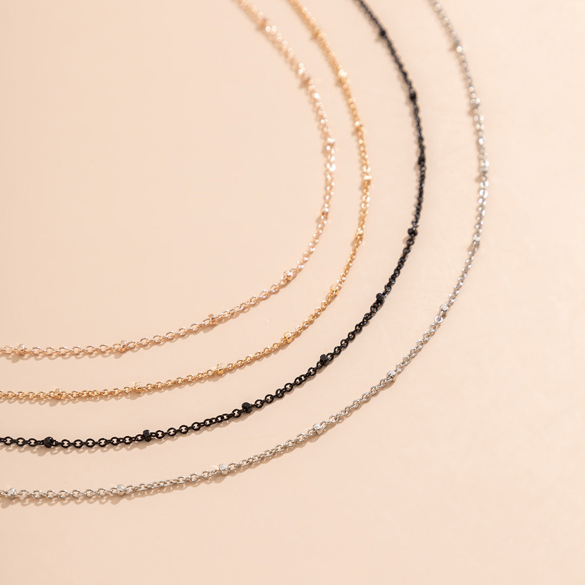 Cadena corporal minimalista para mujer con delicadas cuentas de metal y diseño de cintura de una sola capa